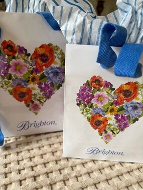 Brighton White Floral Heart Gift Bags with Blue Handles Set of two.
